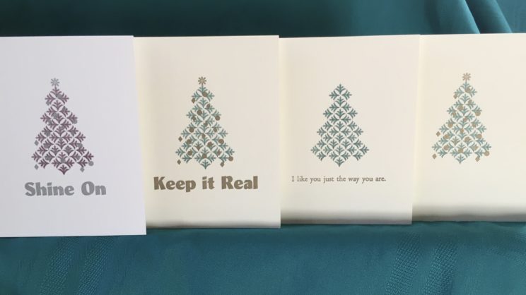 Shows 4 new Christmas card designs